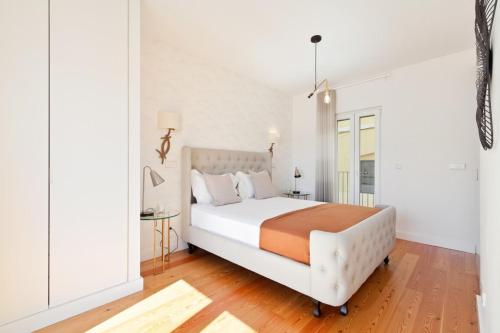 Letto o letti in una camera di Bright 2 Bedroom Apartment with parking in Lisbon