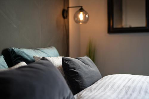 Cama o camas de una habitación en Hrafntinna Villa