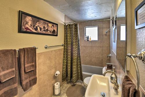 a bathroom with a sink and a toilet and a shower at Vintage Downtown Vegas Retreat Less Than 3 Mi to Strip! in Las Vegas