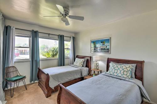 a bedroom with two beds and a window at Vintage Las Vegas Oasis Less Than 3 Mi to the Strip! in Las Vegas
