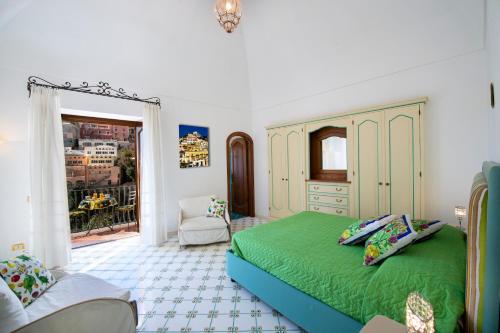 Ένα ή περισσότερα κρεβάτια σε δωμάτιο στο Casa Leucosia, Positano centro