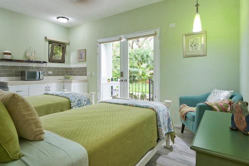 Postel nebo postele na pokoji v ubytování Hotel Casa Leona