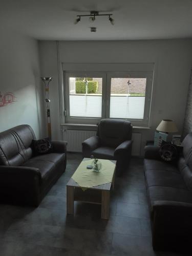 Ein Sitzbereich in der Unterkunft Ferienhaus Middenmank