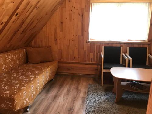 Posezení v ubytování Kaimo Turizmo Sodyba Šniūrai