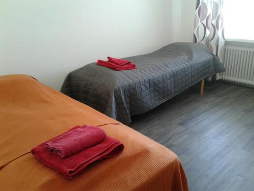 Ένα ή περισσότερα κρεβάτια σε δωμάτιο στο Apartementos Saukkohaka