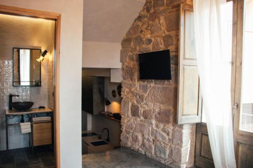 Televízia a/alebo spoločenská miestnosť v ubytovaní Casa Boutique nº 24