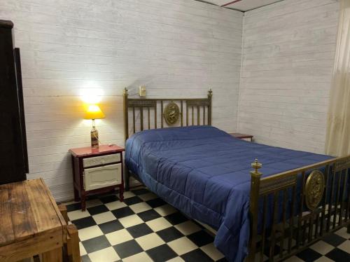 En eller flere senger på et rom på Villa Margarita