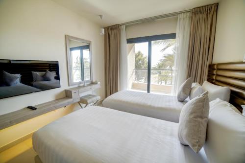 Llit o llits en una habitació de Sea view hotel