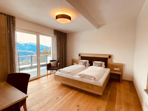 Postel nebo postele na pokoji v ubytování Ferienwohnungen Reinbacher - Primps
