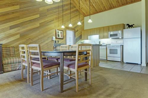 a kitchen and dining room with a table and chairs at Seventh Mountain Resort in Bend