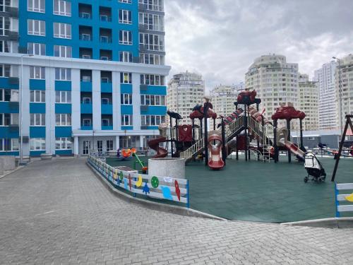 a playground in the middle of a city at Omega 6 in Odesa