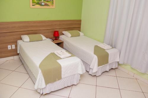 Krevet ili kreveti u jedinici u okviru objekta Domus Hotel Torre Canaã dos Carajás