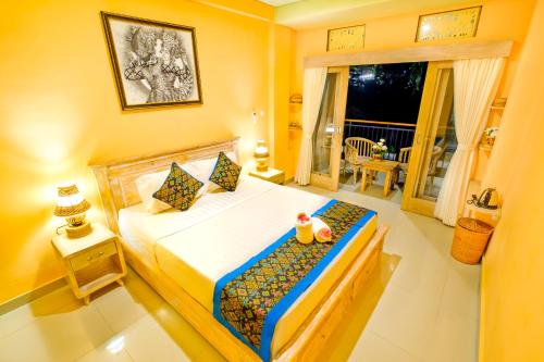 En eller flere senge i et værelse på Bali Ubud Harmony