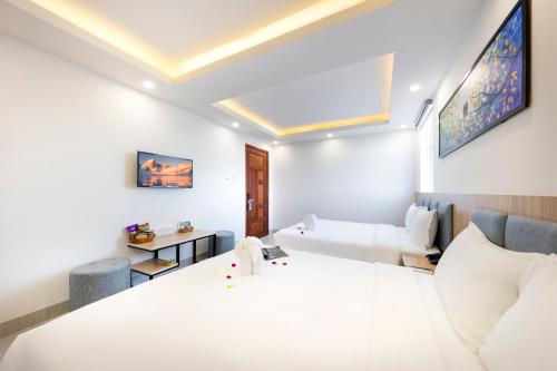 Ένα ή περισσότερα κρεβάτια σε δωμάτιο στο SALAH HOTEL
