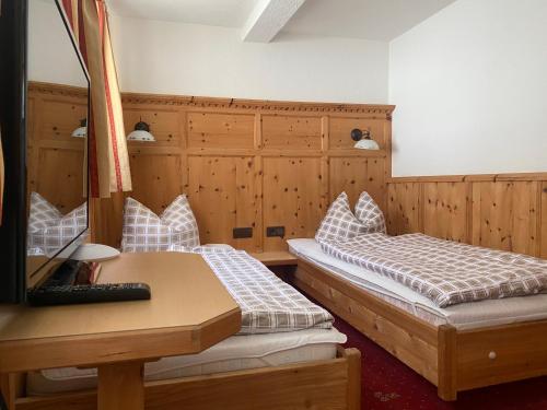 Voodi või voodid majutusasutuse Chalet Prantl toas