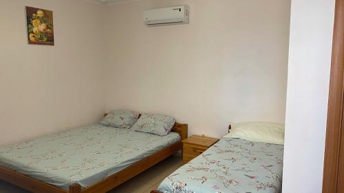 Postel nebo postele na pokoji v ubytování Mini-Hotel Luch