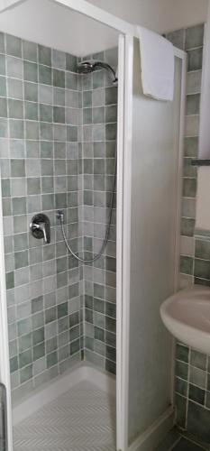 a bathroom with a shower and a sink at I Lecci in Lerici