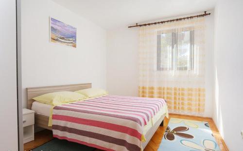 Posteľ alebo postele v izbe v ubytovaní Katja Apartment