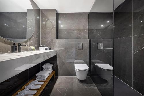 Een badkamer bij Grand Hotel Adriatic