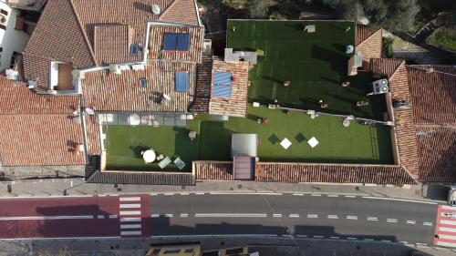 an aerial view of a house with a lawn at Hotel Sorriso in Brenzone sul Garda