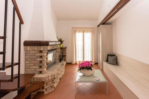 A seating area at Hotel Residence - Il Giardino del Cigno