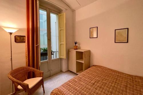 Ένα ή περισσότερα κρεβάτια σε δωμάτιο στο PetinoInApulia - Appartamento per famiglie e amici