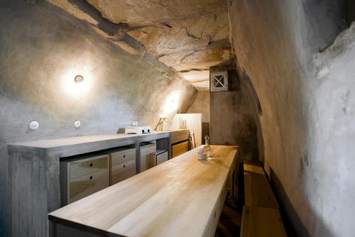 A kitchen or kitchenette at Alonaki Tinos Rental Cottage house