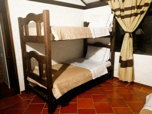 Двухъярусная кровать или двухъярусные кровати в номере LoMar Sol&Luna