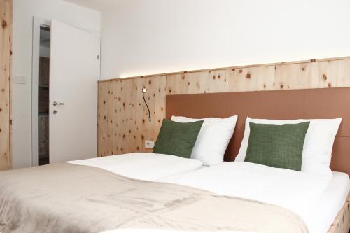 Postel nebo postele na pokoji v ubytování Apartments Rainer