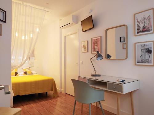 Postel nebo postele na pokoji v ubytování Hotel Smile & Co Hostal Boutique