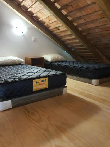 Un ou plusieurs lits dans un hébergement de l'établissement Moorea Lodge
