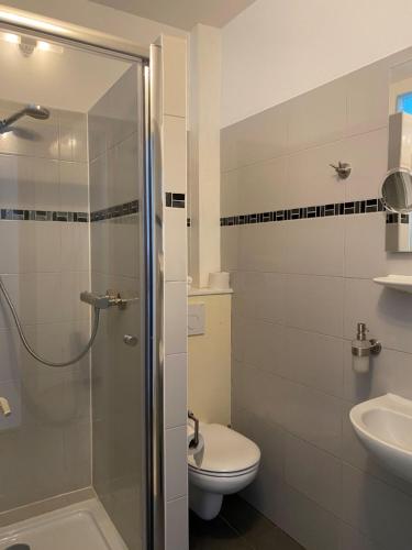 Koupelna v ubytování Hôtel Les Acteurs