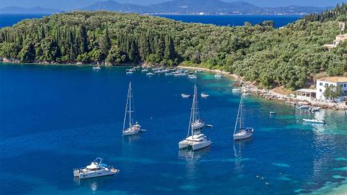 a group of boats in a large body of water at Paleopetres K-Nine - Premium Suite - Kalami - in Kalami