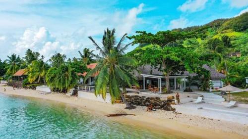 an aerial view of a resort on a beach at Moorea Island Beach Hotel in Moorea