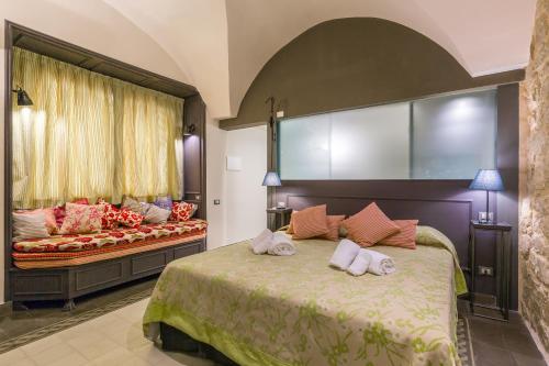 Ένα ή περισσότερα κρεβάτια σε δωμάτιο στο I Mori - Design Apartments