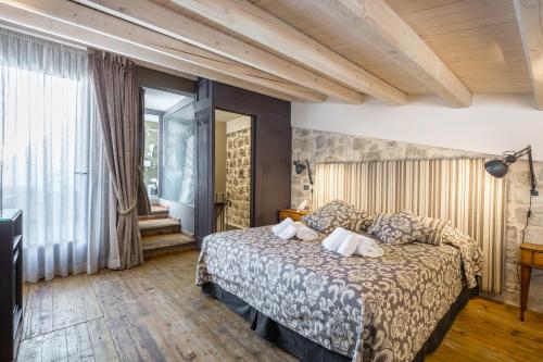 Llit o llits en una habitació de I Mori - Design Apartments