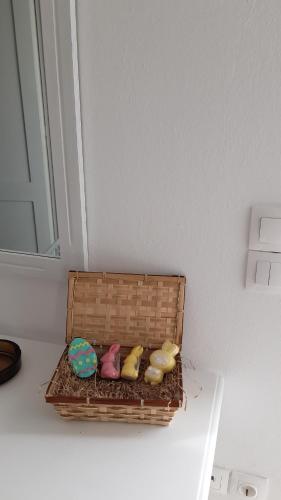 a basket of cookies sitting on top of a table at Fortina Mykonos house in Klouvas