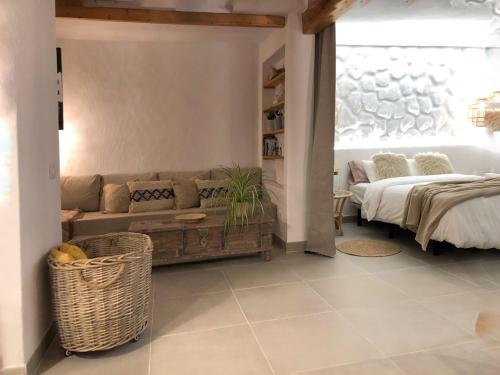 Posteľ alebo postele v izbe v ubytovaní Casita blanca cerca de Timanfaya