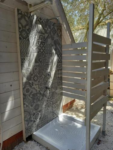 a stairway leading up to a building with a wall at Sunseabeach in Marzamemi