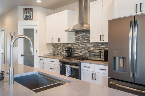 Η κουζίνα ή μικρή κουζίνα στο Fox Creek 2 townhouse