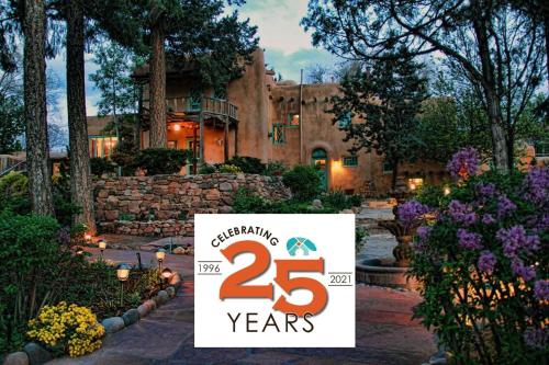a sign that says celebrating years in front of a house at Inn of the Turquoise Bear in Santa Fe