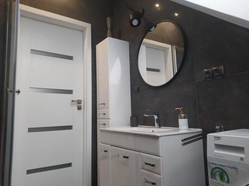 Koupelna v ubytování Apartament Muzyczny