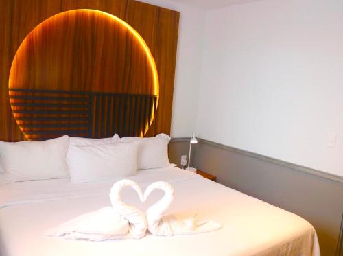 Postel nebo postele na pokoji v ubytování Singular Joy Vacation Rentals