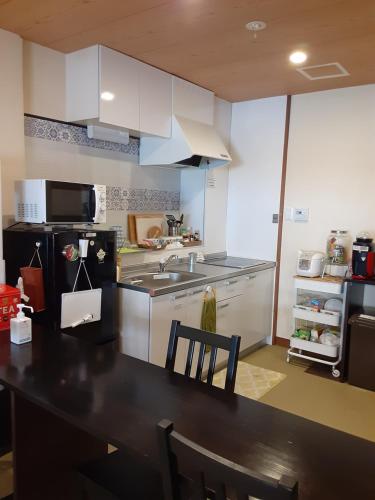 Kuchyň nebo kuchyňský kout v ubytování Hilo Hostel