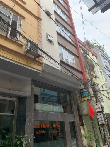 a store front of a building in a city at Viet Thanh Hotel in Ha Long