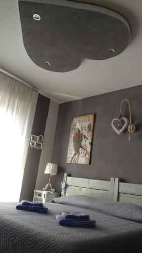 Ένα ή περισσότερα κρεβάτια σε δωμάτιο στο Caicai Bed And Breakfast