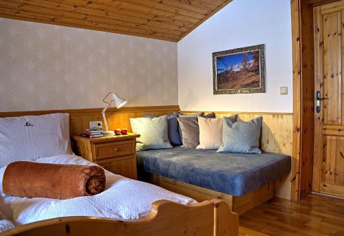 Postel nebo postele na pokoji v ubytování Haberlhof