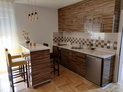 Kuchyň nebo kuchyňský kout v ubytování Apartman Jasna