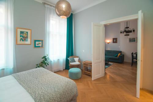 Posteľ alebo postele v izbe v ubytovaní Stross Apartments