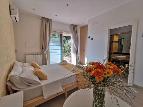 Letto o letti in una camera di La Suscella Bed & Breakfast